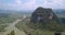 Karst formations and agricultural fields divided by a river in Guangxi province of China