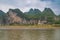 Karst mountain grouip under blue cloudscape along Li River in Guilin, China