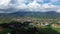 A karst peak and mountains in the green countryside