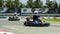 Kart racers rejoicing near the end of the competition
