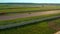 Kart racing competition in summertime in golden hour. Aerial view 4k video. Karts moving on race circuit