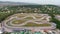 Karting race track, aerial view background. Competition. Buggy kart racing around curves.