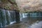 Karuizawa Shiraito waterfalls peaceful natural area featuring a small arc-shaped waterfall framed by mountain slopes