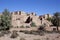 Kasbah Taourirt with clear blue sky.