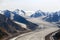 The Kaskawulsh Glacier flows between the mountains in Kluane National Park, Yukon, Canada