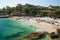 Kassiopi Beach, Corfu Island, Greece. Sunbeds and parasols (sun