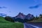 Kastelruth, Italy - 28 June 2018: The road leading to the  Seiser Alm with Sassolungo Langkofel Dolomite in Kastelruth,