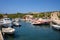 KASTOS island, GREECE-August,2019: Part of small port of Kastos island with moored boats - Ionian sea, Greece in summer