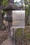 Kasuga stone lantern and metal information panel describing in Japanese and English the story of the grand Buddha Shaka Nyorai