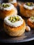 Kataifi, kadayif, kunafa, baklava pastry nest cookies with pistachios with tea. Cooking sweets turkish, or arabic traditional