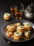 Kataifi, kadayif, kunafa, baklava pastry nest cookies with pistachios with tea. Cooking sweets turkish, or arabic traditional