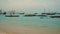 Katara tenth traditional dhow festival in Doha Qatar after noon zooming in shot showing dhows in the Arabic gulf