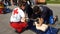 KATERINI, GREECE - OCTOBER 17 2018: The instructor of Red Cross showing CPR on training doll