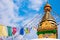 Kathesimbhu Stupa with Buddha eyes and prayer colorful flags in