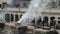 Kathmandu, Nepal - 14 November 2019: A death corpse burning, Pashupatinath Temple Cremations On The Bagmati River