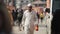 Kathmandu, Nepal - 14 November 2019: A nepalese middle-aged man walking through streets of Kathmandu, Nepal. White