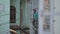 Kathmandu, Nepal - 27 November 2019: An emotional Indian Nepali young girl stands on the balcony and talks to someone