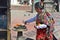 Kathmandu, Nepal, October, 25, 2012, Nepali Scene: Nepalese woman commits Buddhist ritual in the temple complex Swayambunath