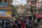 Kathmandu, Nepal - October 30, 2021: Busy street in the capital city of Nepal. Motorcycles and Cars sharing the limited space on