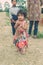 Kathmandu, Nepal - September 22, 2016: Unidentified Nepalese little girl carrying colorful bags in her hand, Nepal.