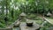 Kathu waterfall water gently flowing down the rocks Patong Phuket Thailand