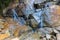 Kathu waterfall water gently flowing down the rocks Patong Phuket Thailand Asia