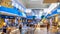 Katowice. Poland 8 August 2020. Escalator people in Silesia City Center Katowice. Interior of retail centre store in soft focus.