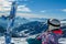 Katschberg - A woman lying on powder snow with her snowboard