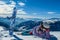 Katschberg - A woman lying on powder snow with her snowboard