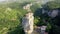 Katskhi pillar. Alone man`s monastery near the village of Katskhi. The orthodox church and the abbot cell on a rocky cliff.