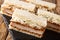 Katsu Sando sandwiches with pork cutlet, tonkatsu sauce and cabbage closeup on a slate board. horizontal