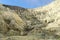 Kawah Ijen, East Java, Indonesia - May 25: Sulfur miner hiking down into the crater of Kawah Ijen volcano in East Java