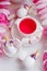 Kawaii tea party concept - scented tea in white cup, decorated unicorn eggs, trendy modern easter holiday breakfast closeup