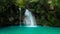 Kawasan waterfall in a mountain gorge in the tropical jungle of the Philippines, Cebu