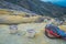 KAWEH IJEN, INDONESIA: Baskets used for carrying sulfur rocks from mine lying scattered around on ground, high altitude