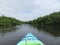 Kayak adventure first person point of view on tropical waterway