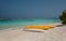 Kayak on the beach .kayaks at beautiful tropical beach with palm trees, white sand, turquoise ocean water and blue sky