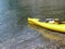 A kayak between the beach and the sea