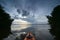 Kayak bow amidst mangrove trees of Coot Bay in Everglades National Park.