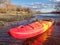 Kayak and fence across river