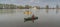 Kayak fishing at lake. Two fisherwomen on inflatable boats with fishing tackle