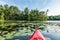 Kayak on Lake with lily pads