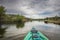 Kayak on lake with overcast sky
