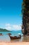 Kayak and longtail boat at beach of Koh Talabeng near Koh Lanta, Krabi, Thailand