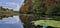 Kayak on mirror Lake fall colors reflecting in the water