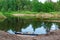 Kayak near the shore against the backdrop of a picturesque river