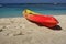 Kayak and paddle by the seashore on the beautiful white sand of Labadee, Haiti.