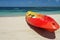 Kayak and paddle by the seashore on the beautiful white sand of Labadee, Haiti.