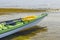 Kayak with a paddle on the shore. Kayaking, water sports, outdoor activities