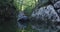 Kayak rowing slow motion. Kayaker woman and man kayaking in a beautiful landscape. Kayakers practice sports in a kayak